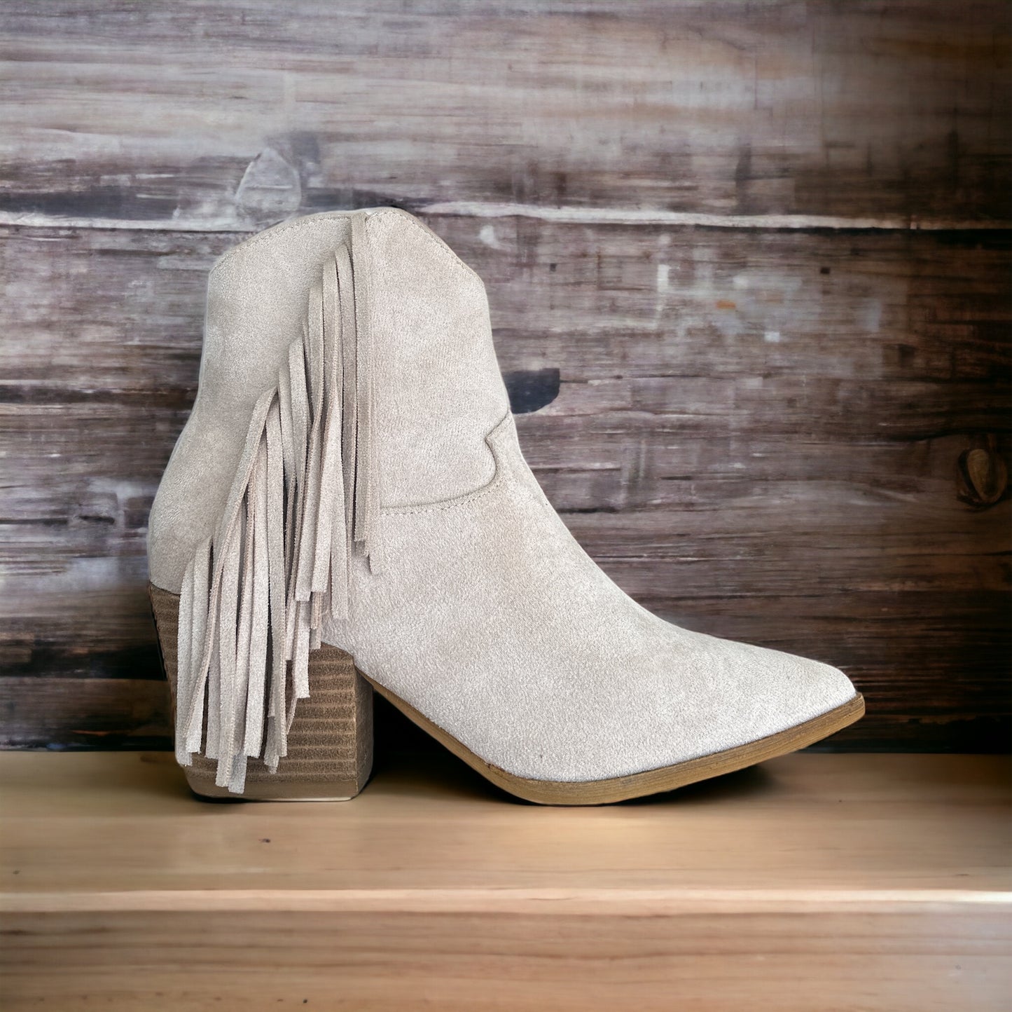 Fringed cowgirl boot